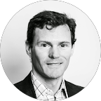 Shawn thanes profilbild med kostym.